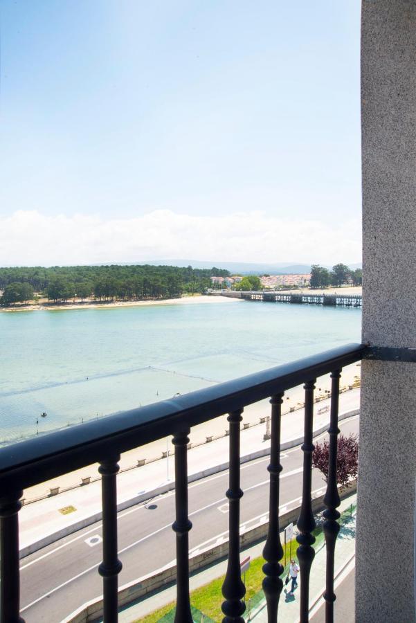 דירות O Grove Centro Con Vistas A La Toja Parking מראה חיצוני תמונה